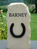 Barney's rustic standingstone with his own horseshoe